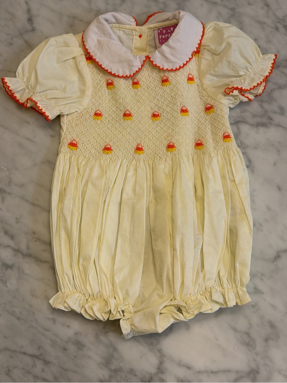 Sweet Yellow Smocked Bubble Romper with Orange Trim - Candy Corn